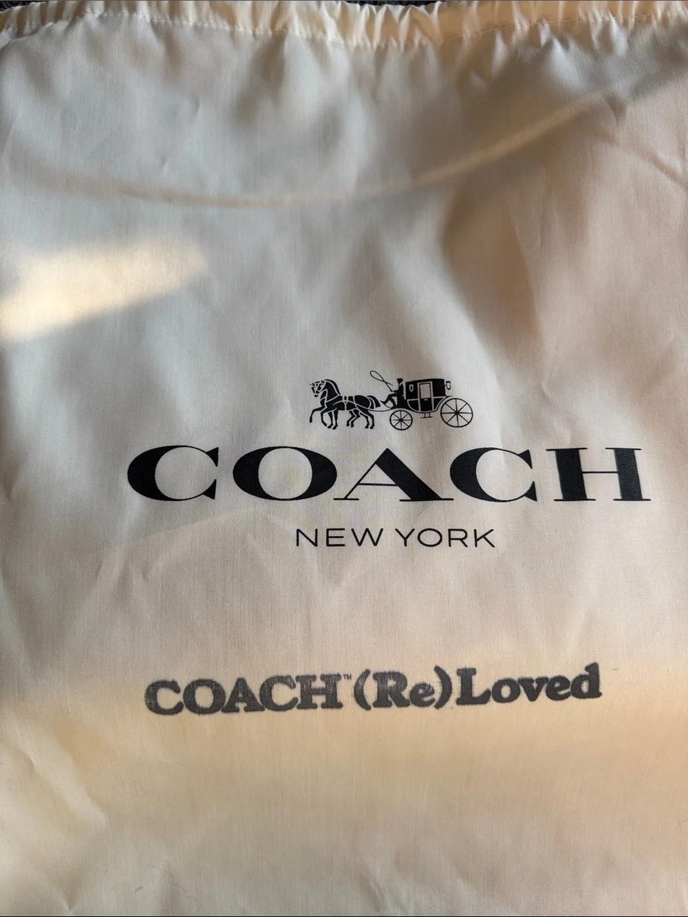 Coach bought reloved